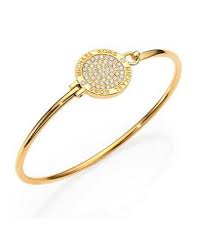 MICHAEL KORS GOLD TONE,ROTATING CRYSTALS PAVE DISK,OPEN CUFF BANGLE MKJ3559